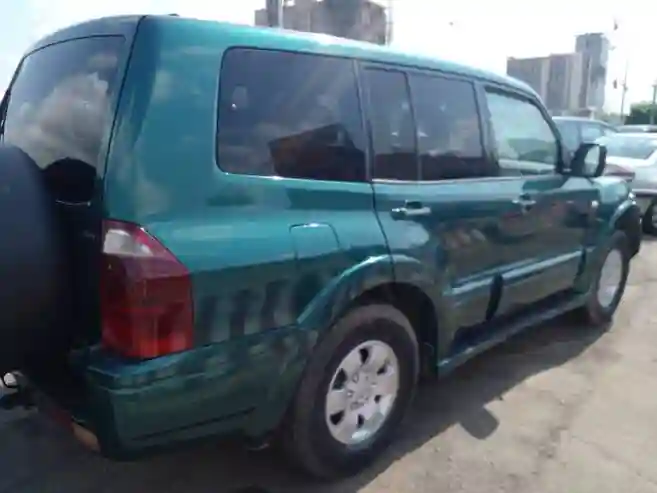 Location Mitsubishi Pajero DID 7 Places Climatisé - Vue 4