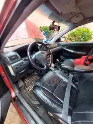 Toyota Corolla 14 Sedan 2002 Rouge