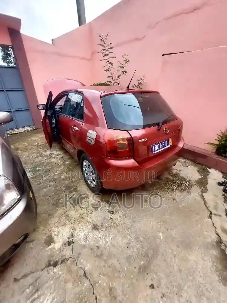 Toyota Corolla 14 Sedan 2002 Rouge - Vue 4