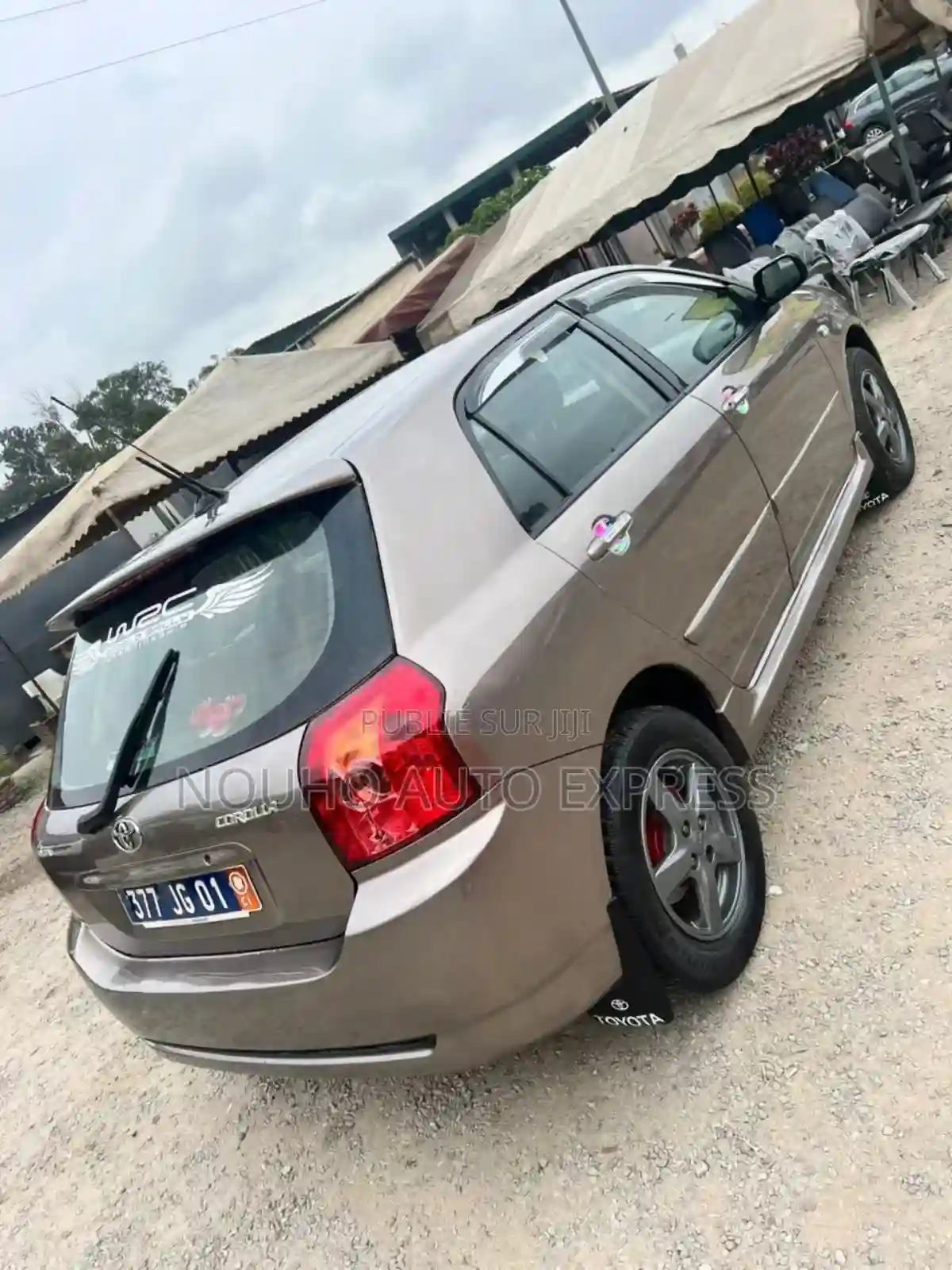 Toyota Corolla 2004 Beige - Vue 1