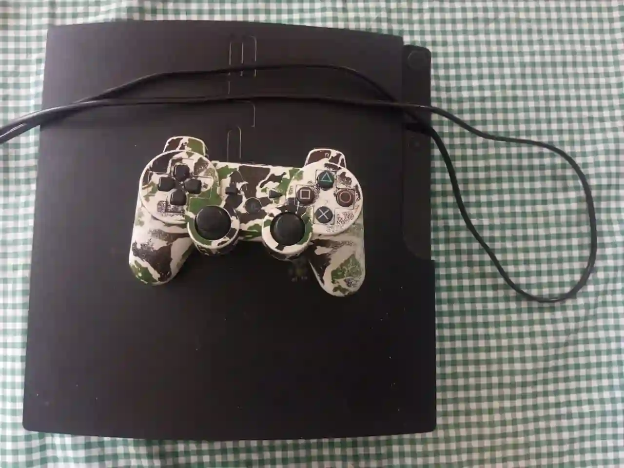 Playsation 3 Slim  - Vue 1