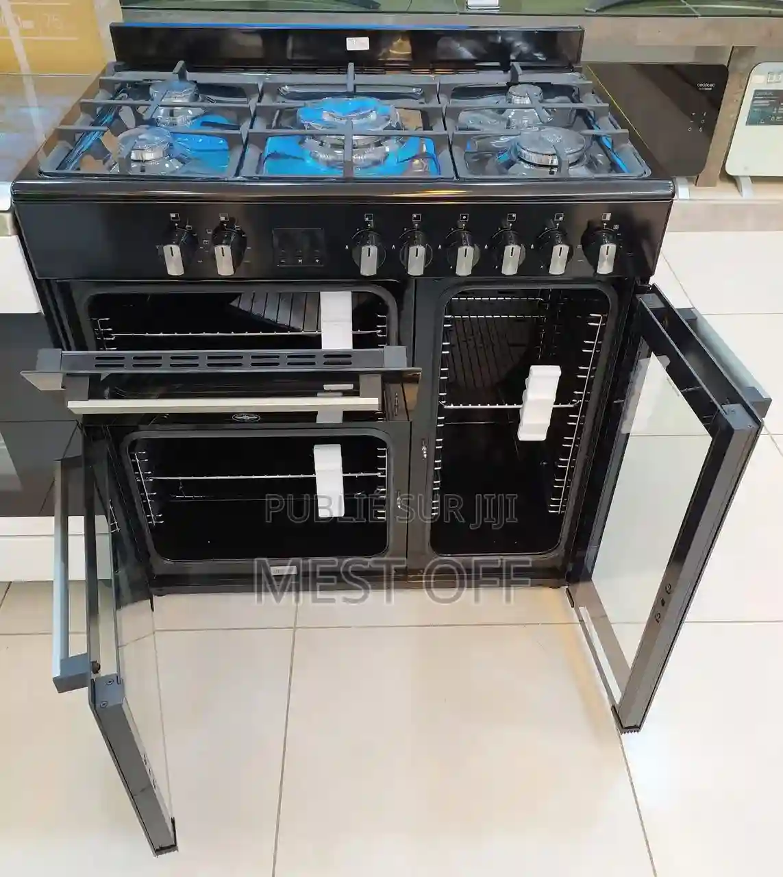 Cuisinière À 5 Feux 2 Fours Et 1 Casier Pour Bouteille De Gaz - Vue 1